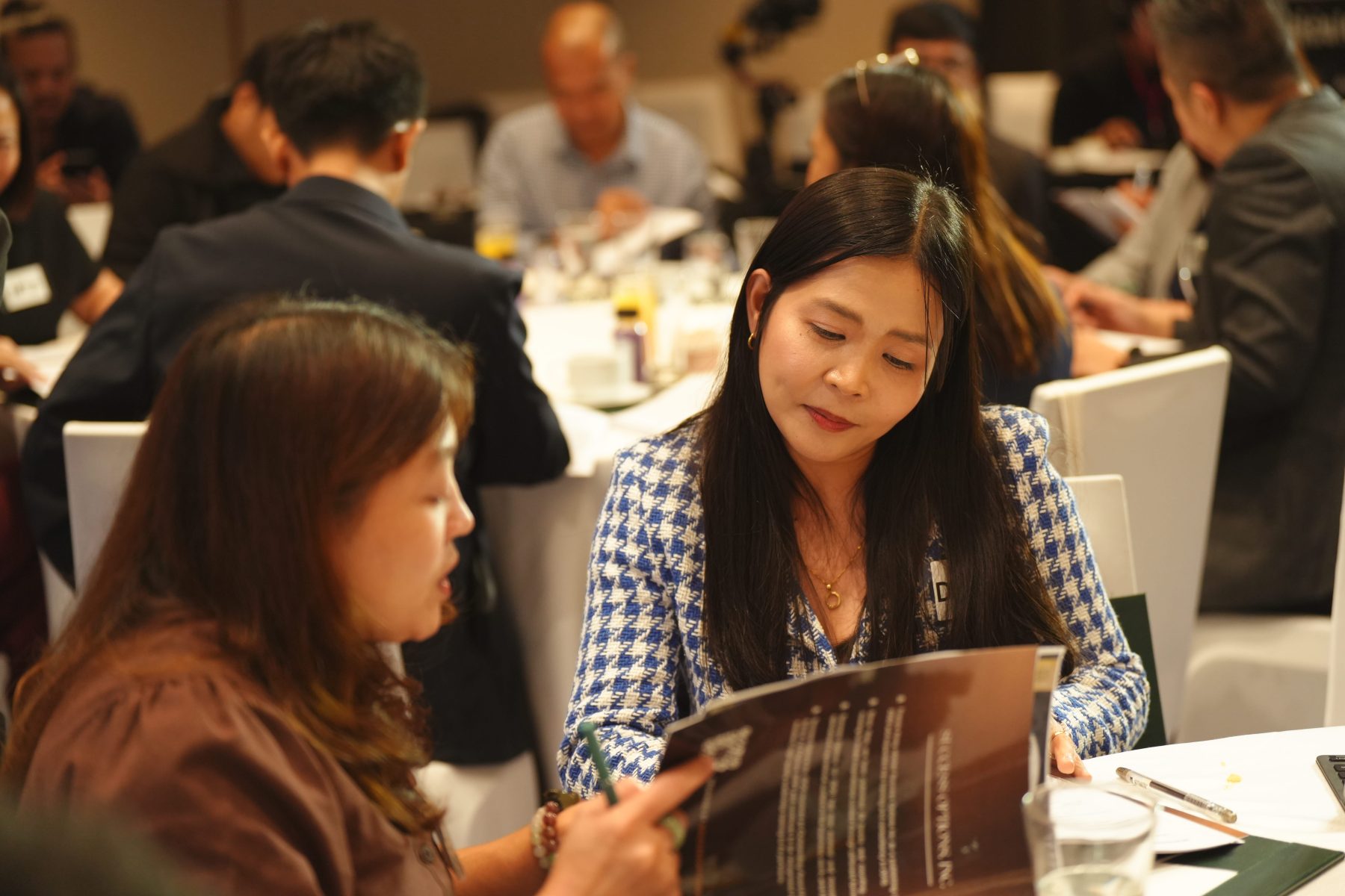 Level Up participants learning and exchanging ideas in a workshop.